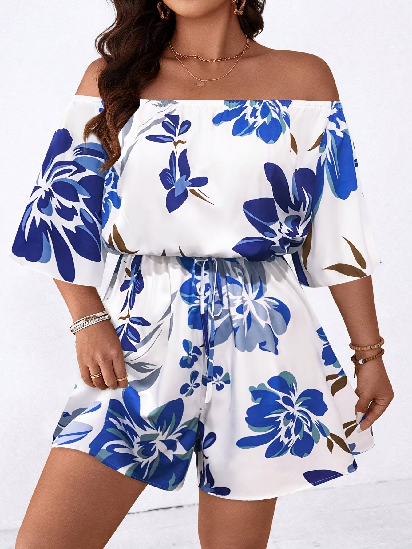 CELESTIA™ | Plus-Size Off-Shoulder Floral Jumpsuit