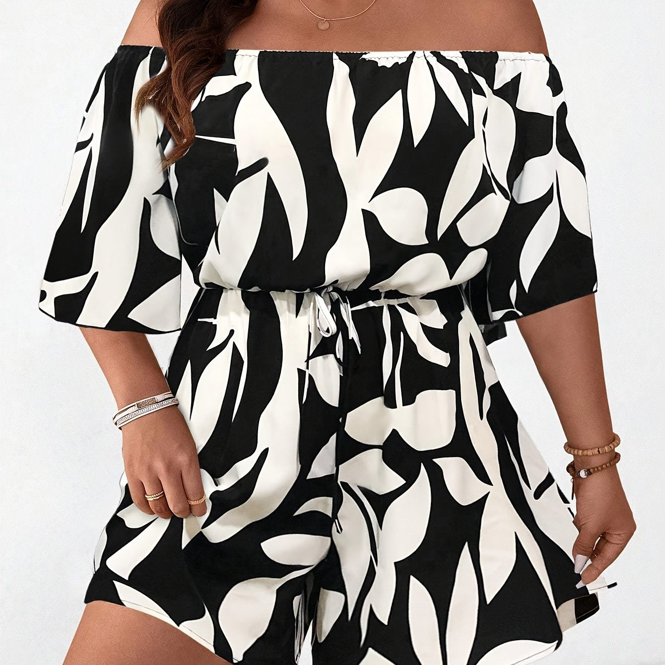 CELESTIA™ | Plus-Size Off-Shoulder Floral Jumpsuit