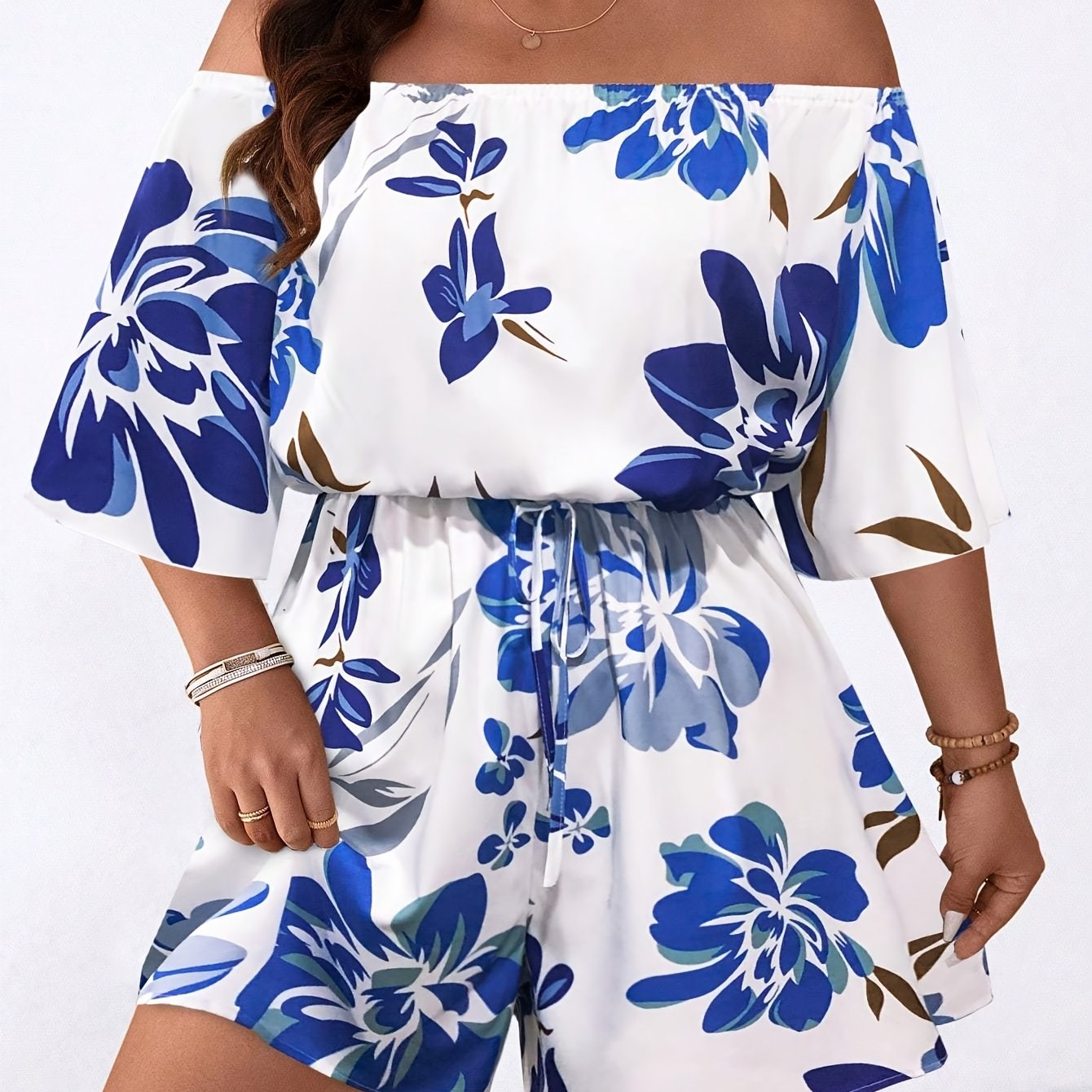 CELESTIA™ | Plus-Size Off-Shoulder Floral Jumpsuit
